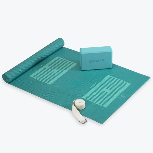 blue yoga mat with yoga block and yoga straps