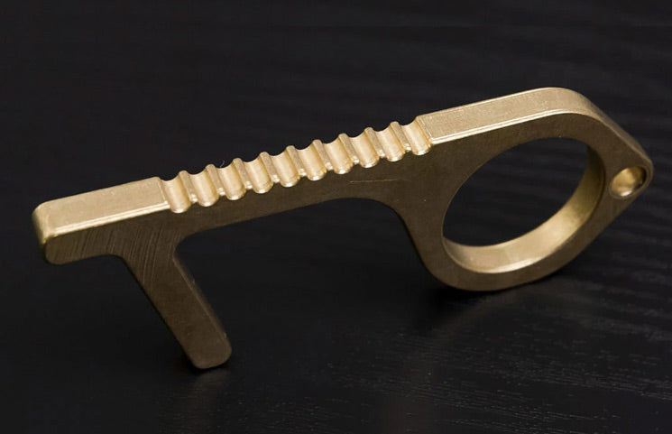 Gold-coloured door opener tool