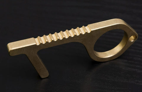 Gold-coloured door opener tool
