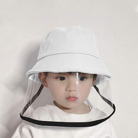 Child wearing white protective hat